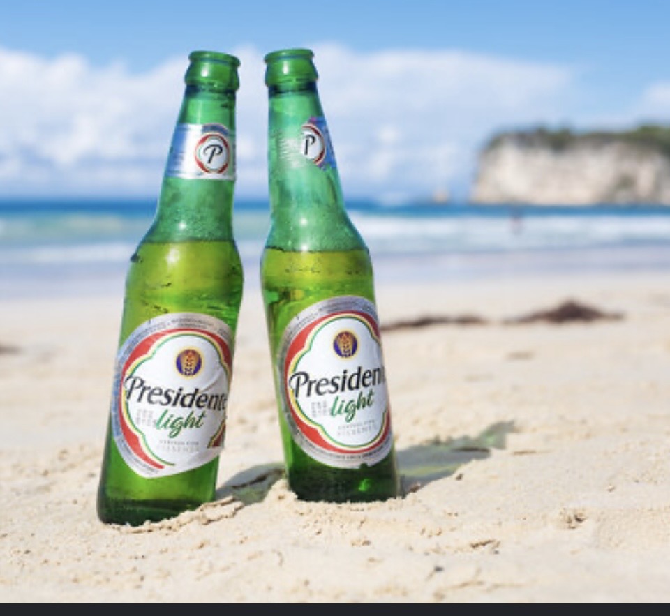 Cerveza Presidente disponible en Mini Market El Golfo